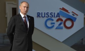 Russia's President Vladimir Putin waits at the start of the G20 summit