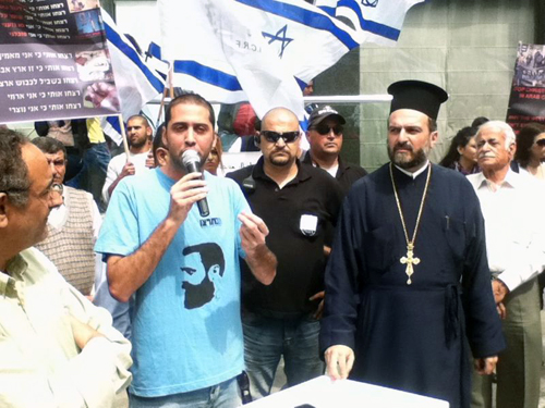 FATHER GABRIEL NADAF AT RIGHT APPEARS AT RALLY CALLING FOR THE WEST TO PROTECT CHRISTIANS IN ISLAMIC COUNTRIES (PHOTO: CHRISTIAN LOBBY)