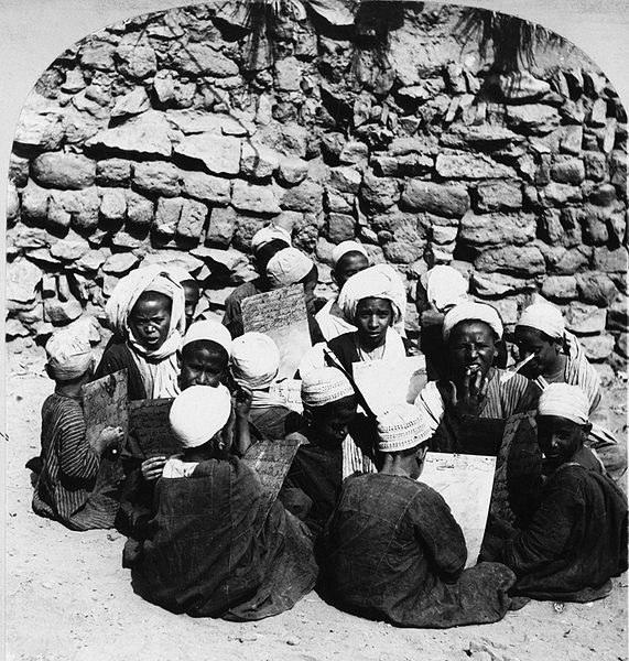 Arabic school, learning the Koran, Egypt. Public Domain. Suggested credit: By Keystone, Library of Congress [VIA PINGNEWS]. Wikimedia Commons