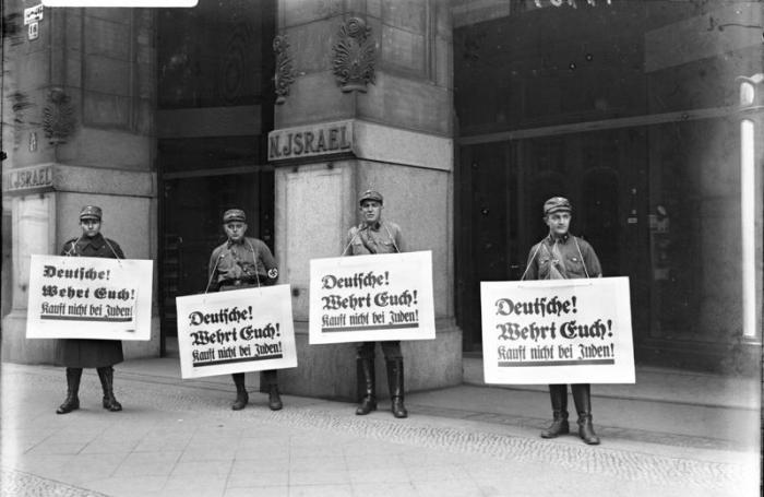 "Germans! Defend yourselves! Don't buy from Jews." ("Deutsche! Wehrt Euch! Kauft nicht bei Juden!")  Wikipedia
