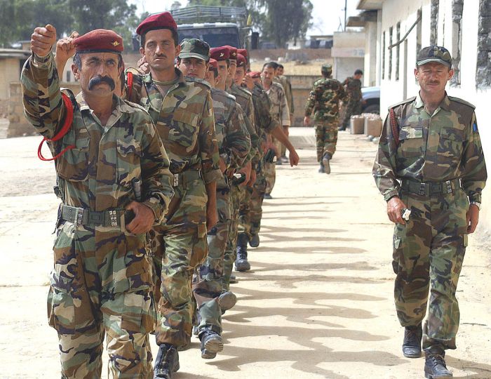 The Kurdish Peshmerga platoon of the newly-formed Joint Iraqi Security Company marches to class, Mosul, Iraq.